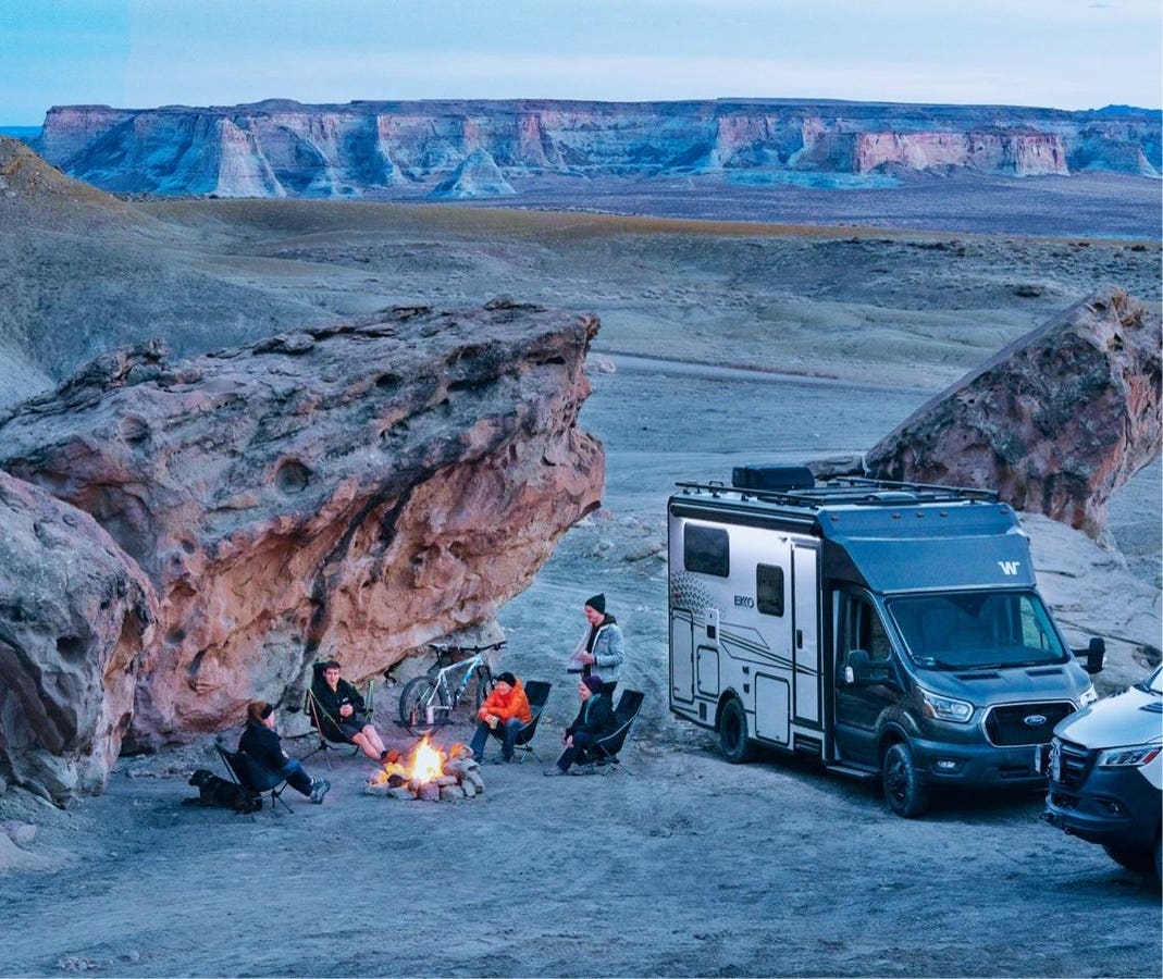 Interior of a modern campervan showing living space and amenities