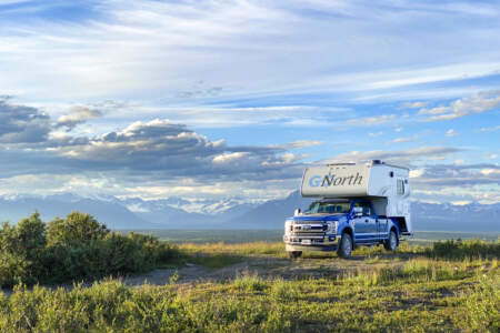 A rented Class C motorhome on a scenic byway near Denver, Colorado
