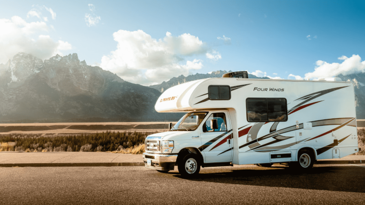 Family enjoying the interior of their Class C motorhome rental in RV Rental motorhome rental