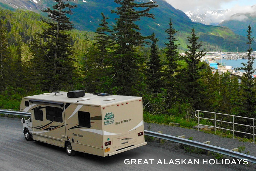 A family enjoying their motorhome rental in the Alaskan wilderness