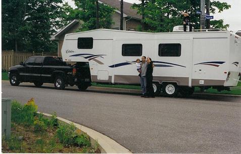 A family enjoying the outdoors with their rented fifth-wheel trailer