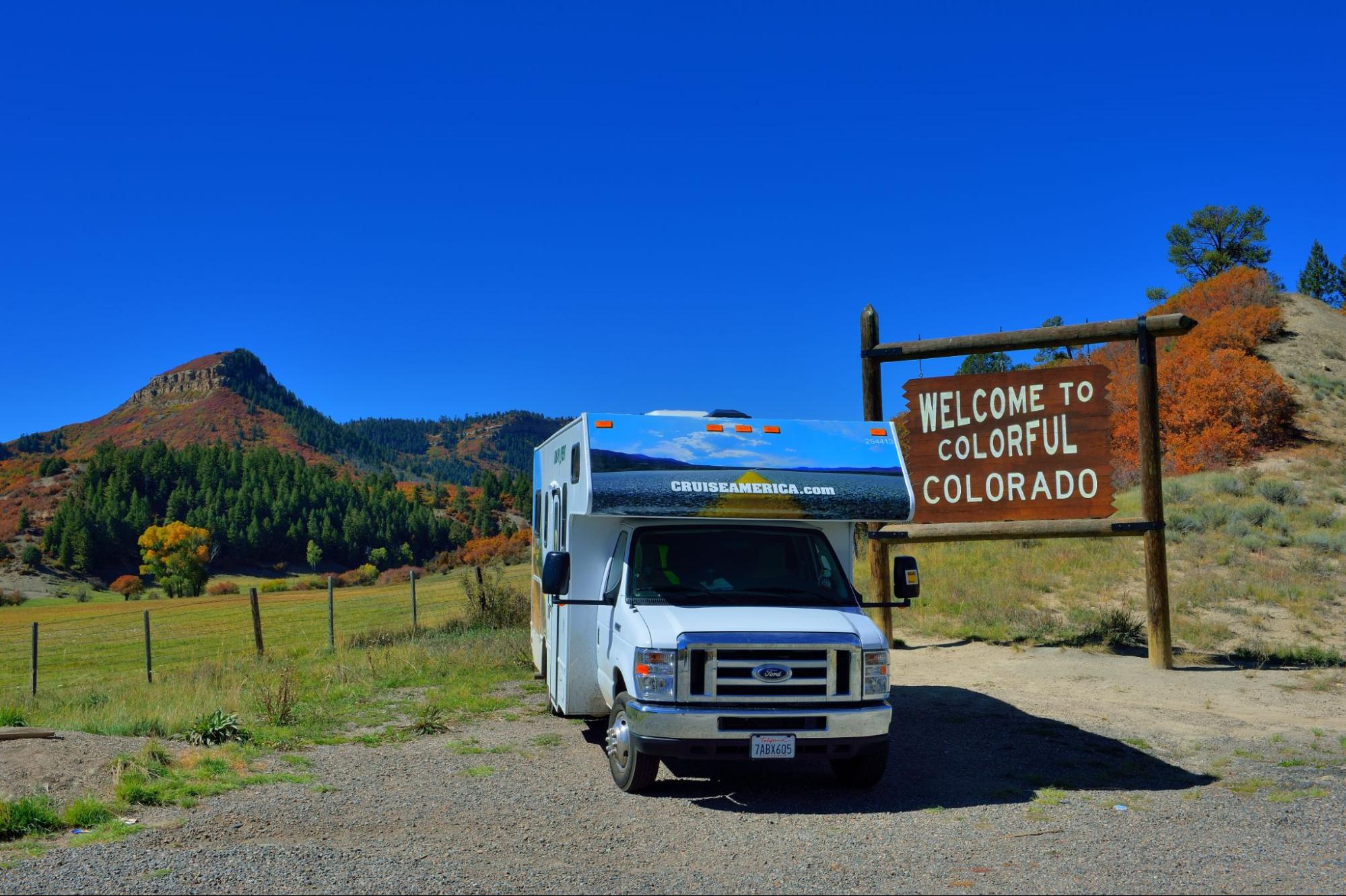 Scenic overview of a Denver area RV park with mountains in the distance