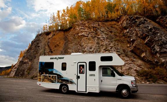 Family enjoying their rented motorhome in a Denver-area campground