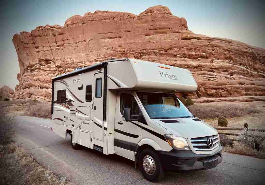 Different types of RVs parked at a campground near Denver