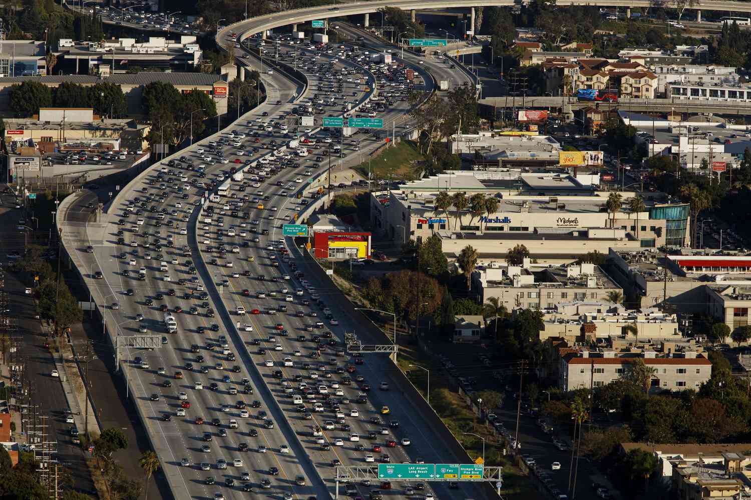 Driving a motorhome on a Los Angeles freeway with palm trees