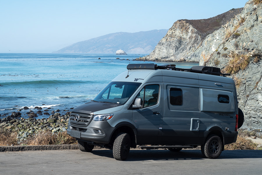 A couple enjoying the view from their rented Class B campervan in San Diego
