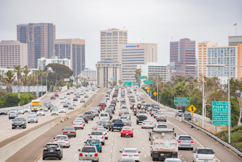 Scenic drive along the coast in San Diego with a car
