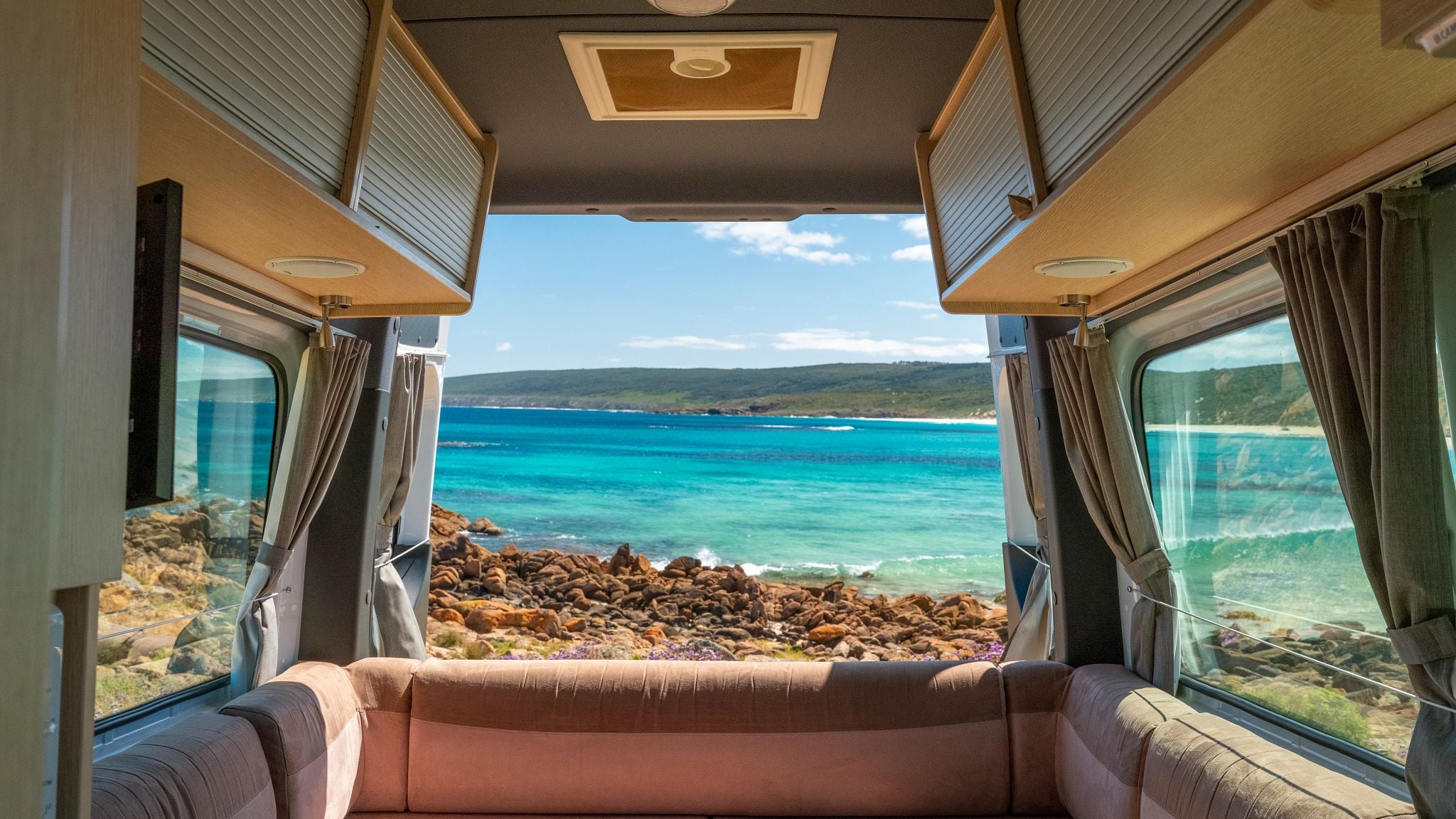 A family enjoying their motorhome rental on a scenic Adelaide road trip