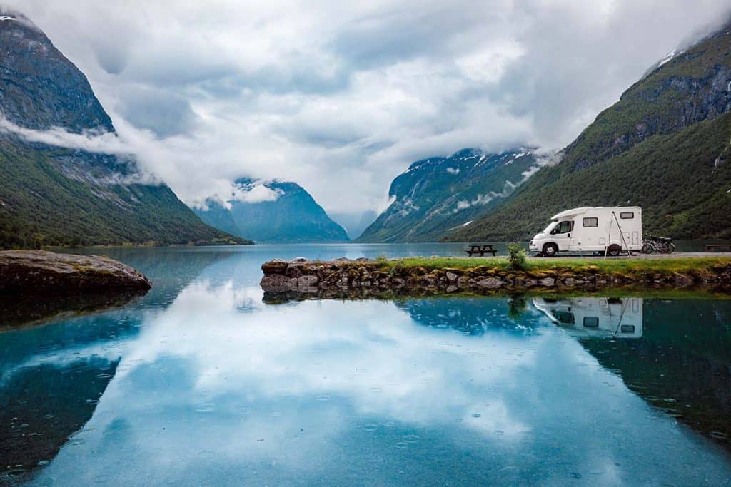 A campervan parked at a scenic campsite near Amsterdam, ready for exploration.