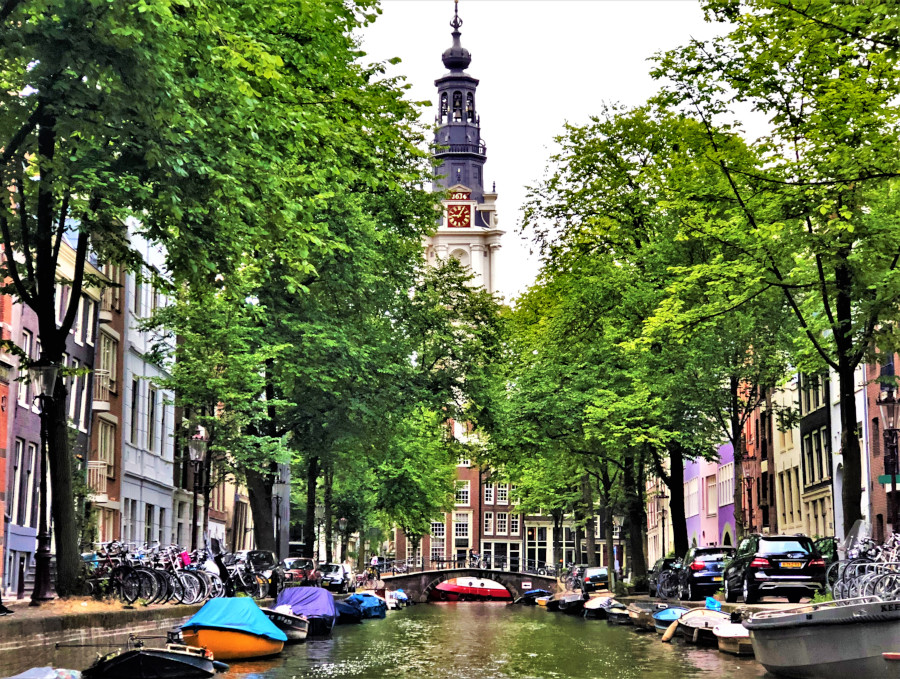 The quaint canals of Amsterdam during the day