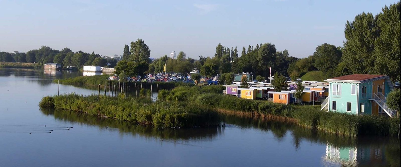 A modern campground with motorhomes parked near Amsterdam