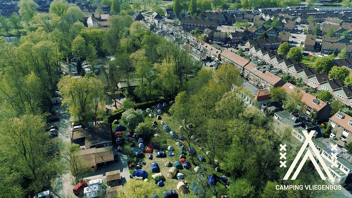Aerial view of Gaasper Camping Amsterdam, showing green pitches for RVs