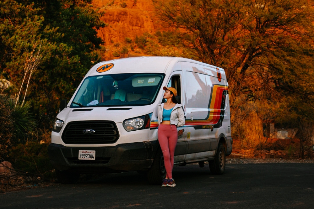 A person enjoying a road trip near Las Vegas in a rented campervan