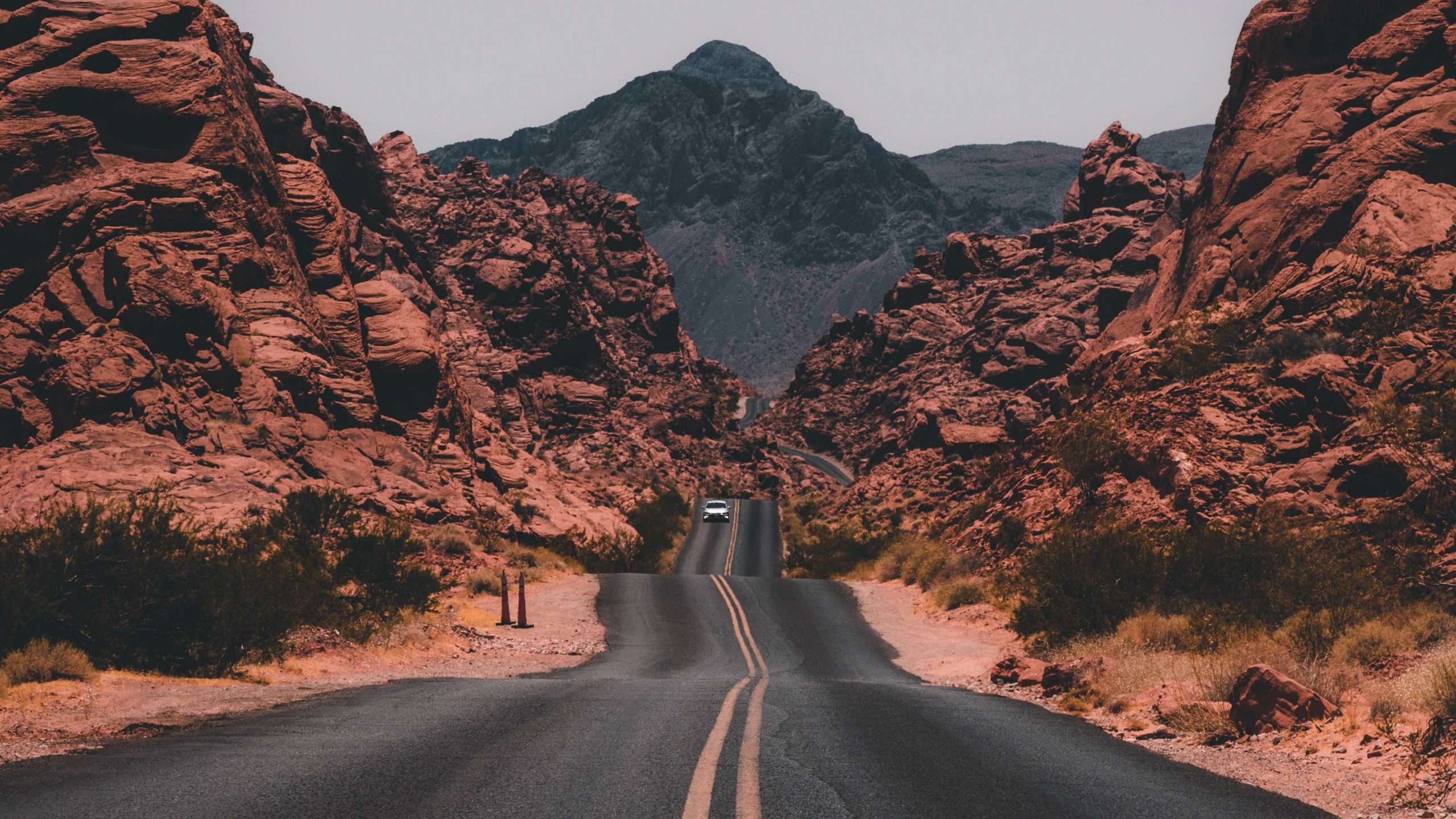 RV driving towards the iconic 'Welcome to Fabulous Las Vegas' sign