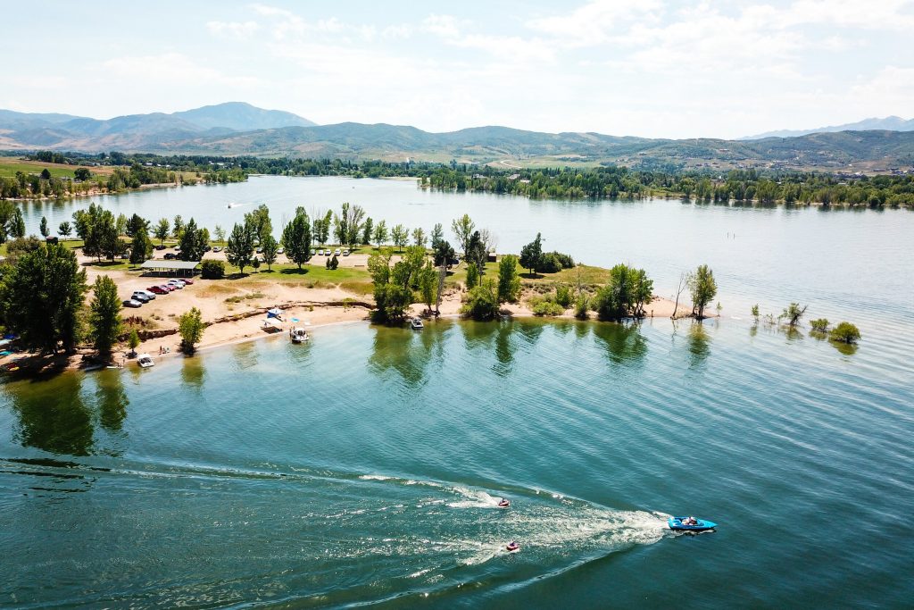 A scenic campground near Salt Lake City with RVs parked by the water