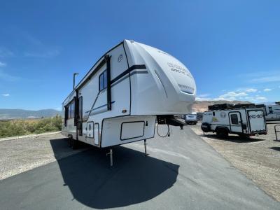 A variety of motorhome classes parked in a lot, showcasing options for a Salt Lake City winter rental.